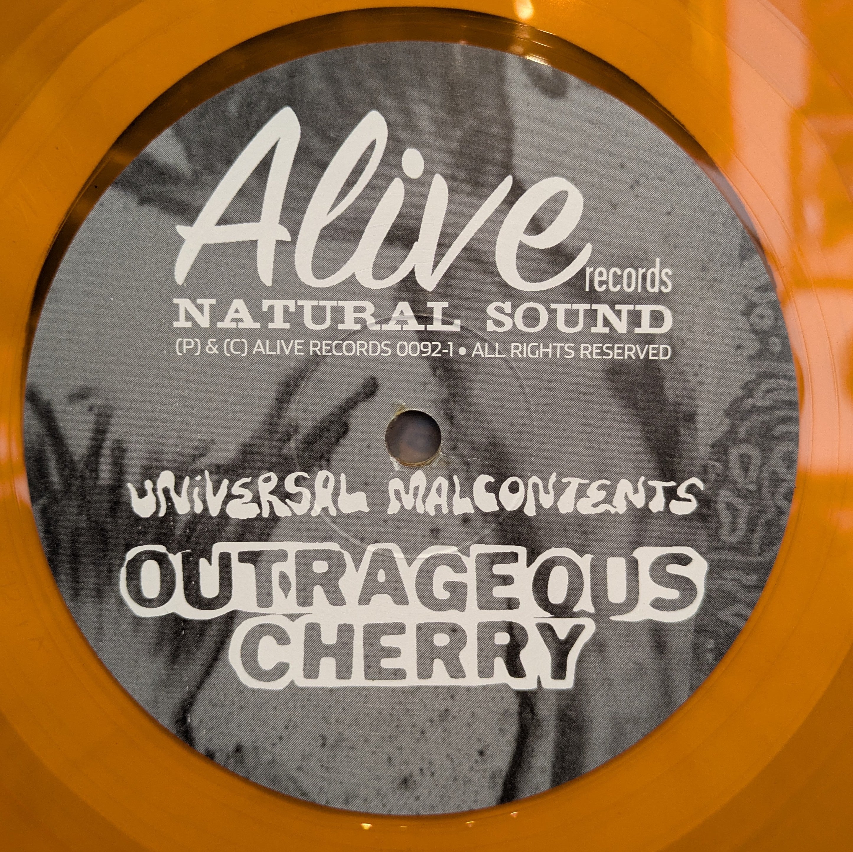 Outrageous Cherry - Universal Malcontents (OPAQUE ORANGE VINYL) | Near Mint (NM) Near Mint (NM)