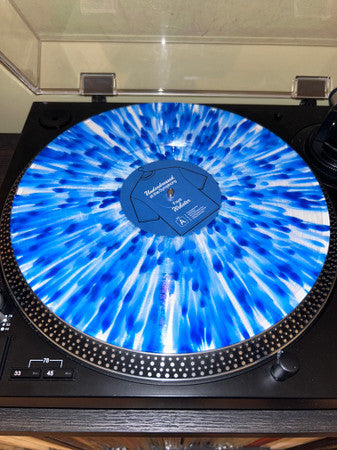 Underdressed At The Symphony (BLUE SPLATTER VINYL) | Mint (M) Mint (M)