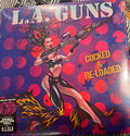 Cocked & Re-Loaded (PURPLE & BLACK SPLATTER VINYL) | Mint (M) Mint (M)