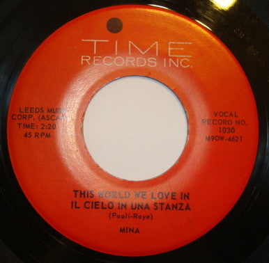 Mina (3) - This World We Love In = Il Cielo In Una Stanza (7" VINYL) | Very Good (VG) Generic