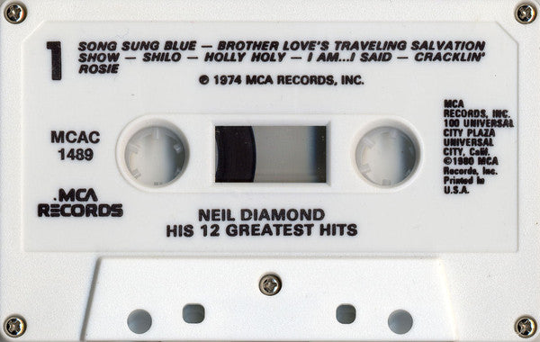 His 12 Greatest Hits (CASSETTE) | Mint (M) Mint (M)