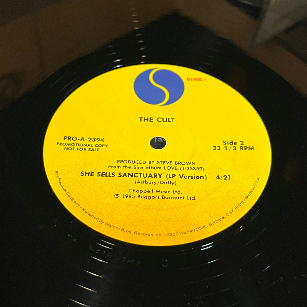 The Cult - She Sells Sanctuary (LP Version)(VINYL) | Near Mint (NM or M-) Very Good Plus (VG+)
