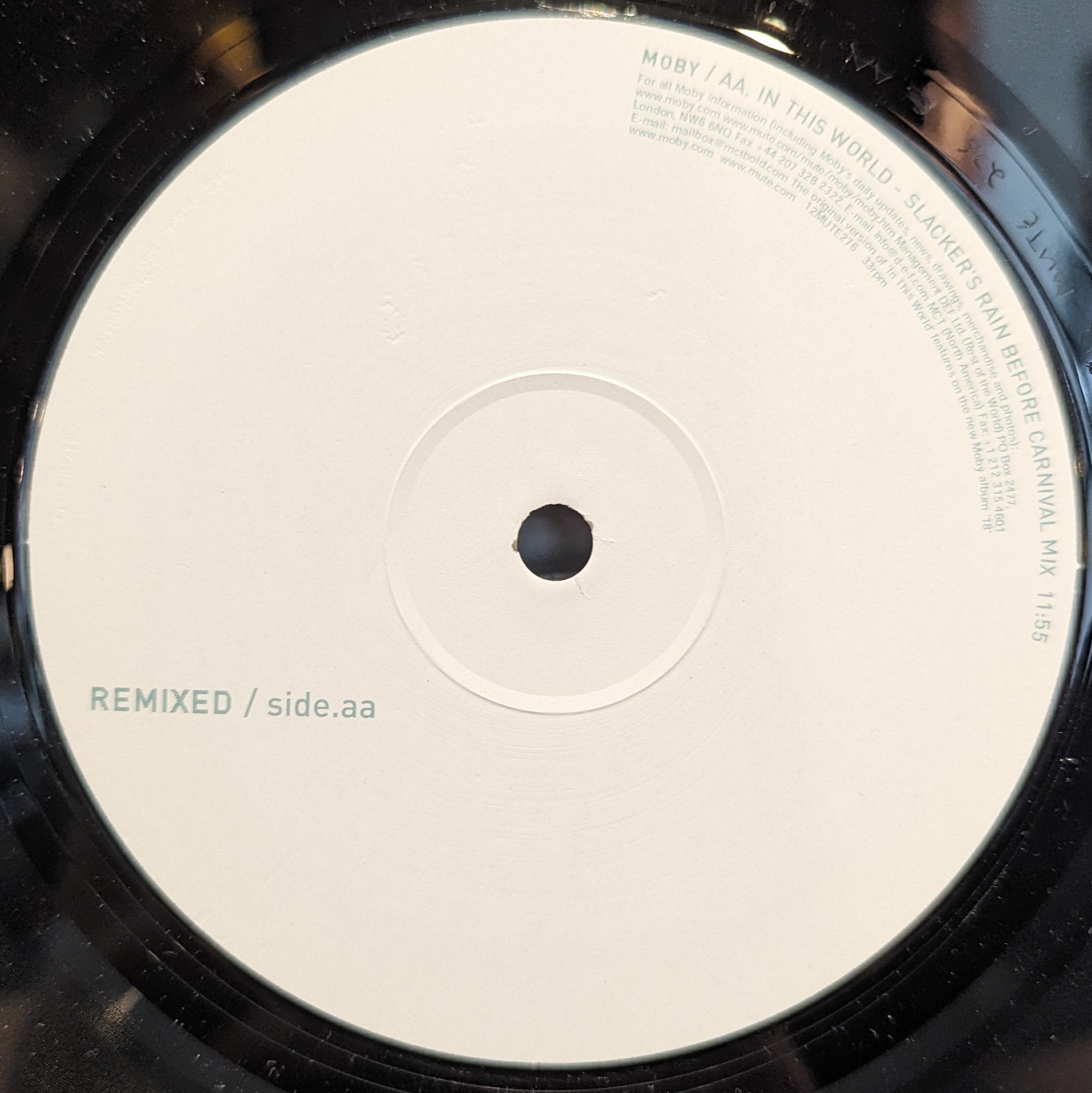 In This World | Near Mint (NM) Very Good (VG)