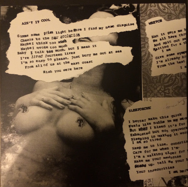 Feral King (HALF CLEAR / HALF BLACK VINYL 7") | Mint (M) Mint (M)