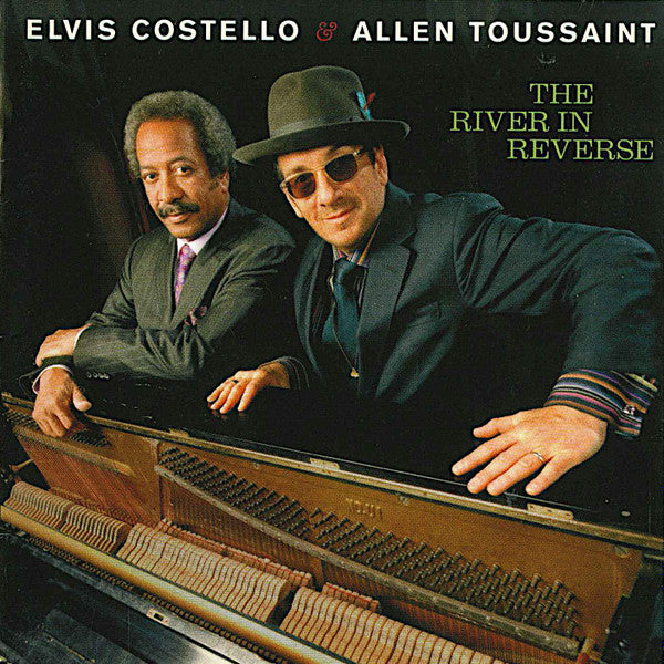 Elvis Costello - The River In Reverse (CD) | Near Mint- (NM-) Excellent (EX)