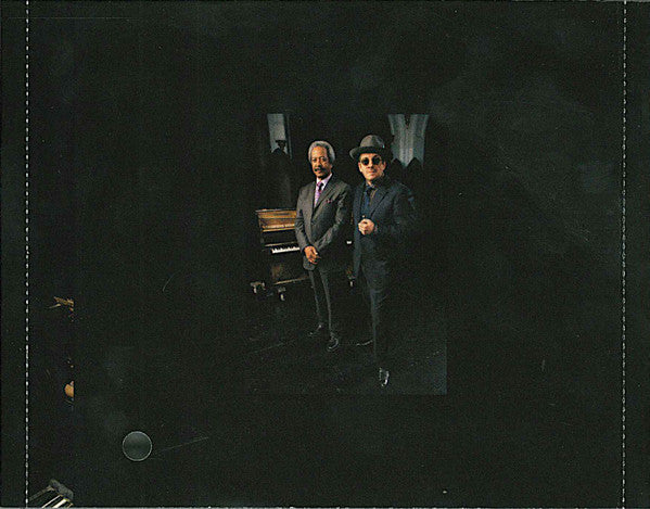 Elvis Costello - The River In Reverse (CD) | Near Mint- (NM-) Excellent (EX)