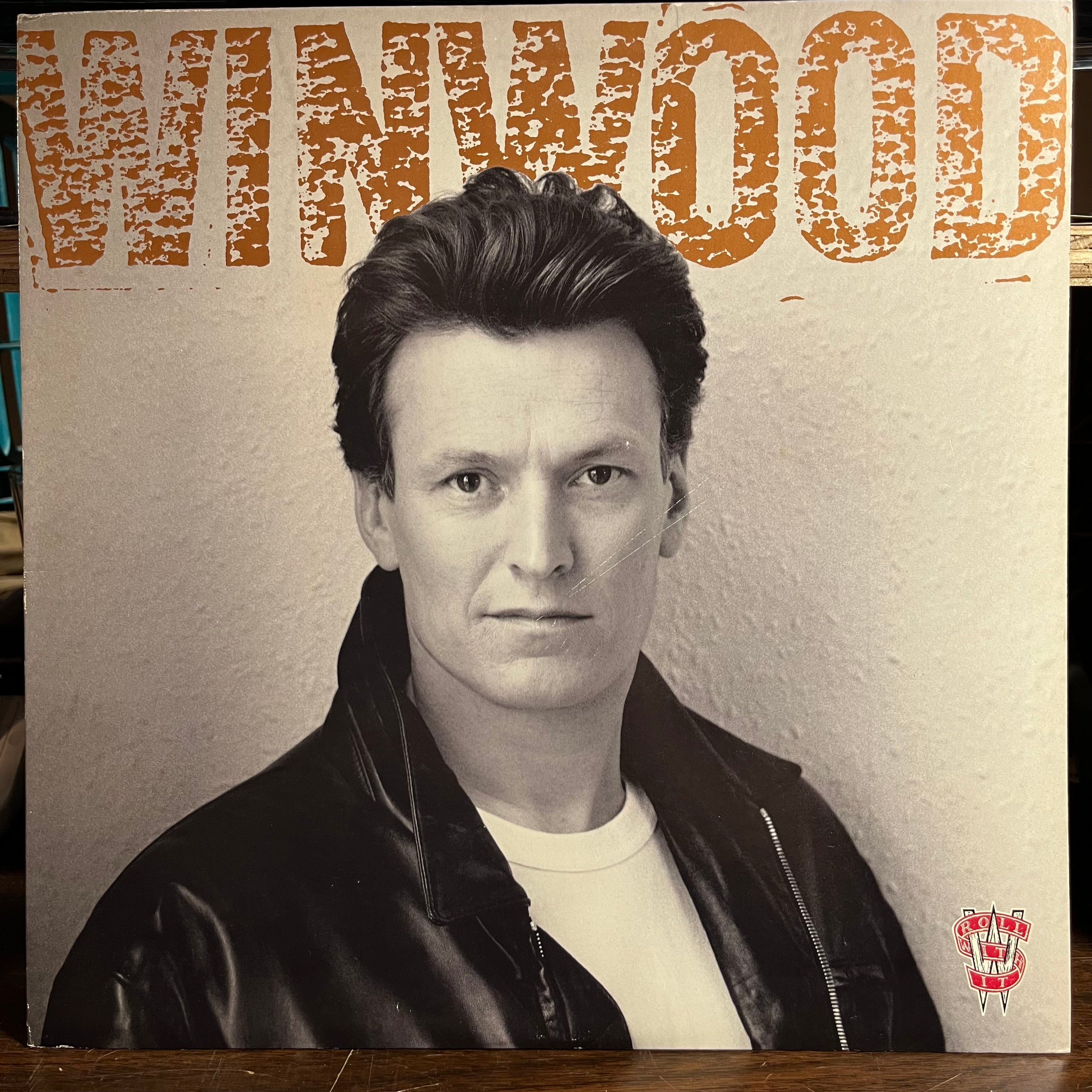 Steve Winwood - Roll With It (VINYL) | Near Mint- (NM-) Excellent+ (EX+)