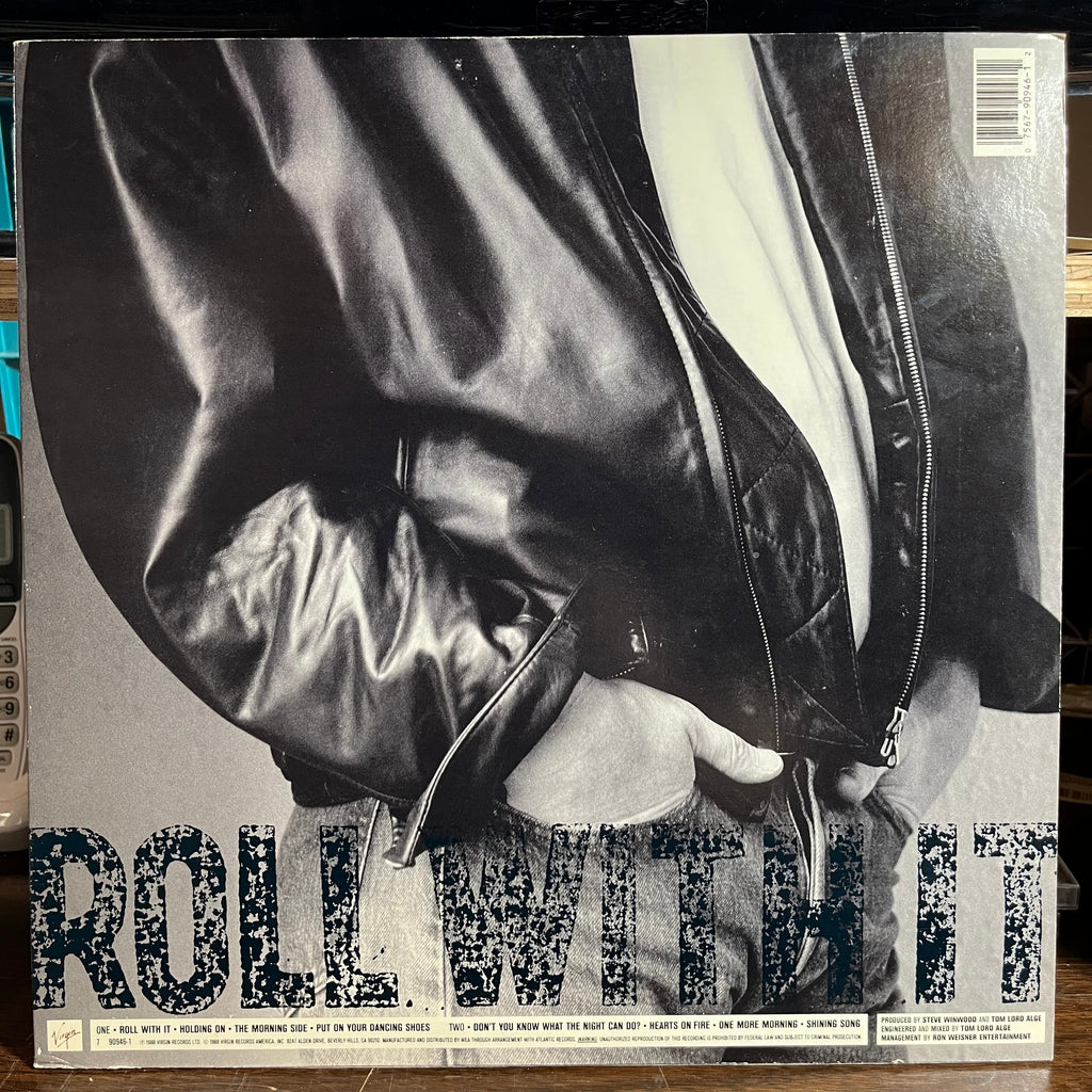 Steve Winwood - Roll With It (VINYL) | Near Mint- (NM-) Excellent+ (EX+)