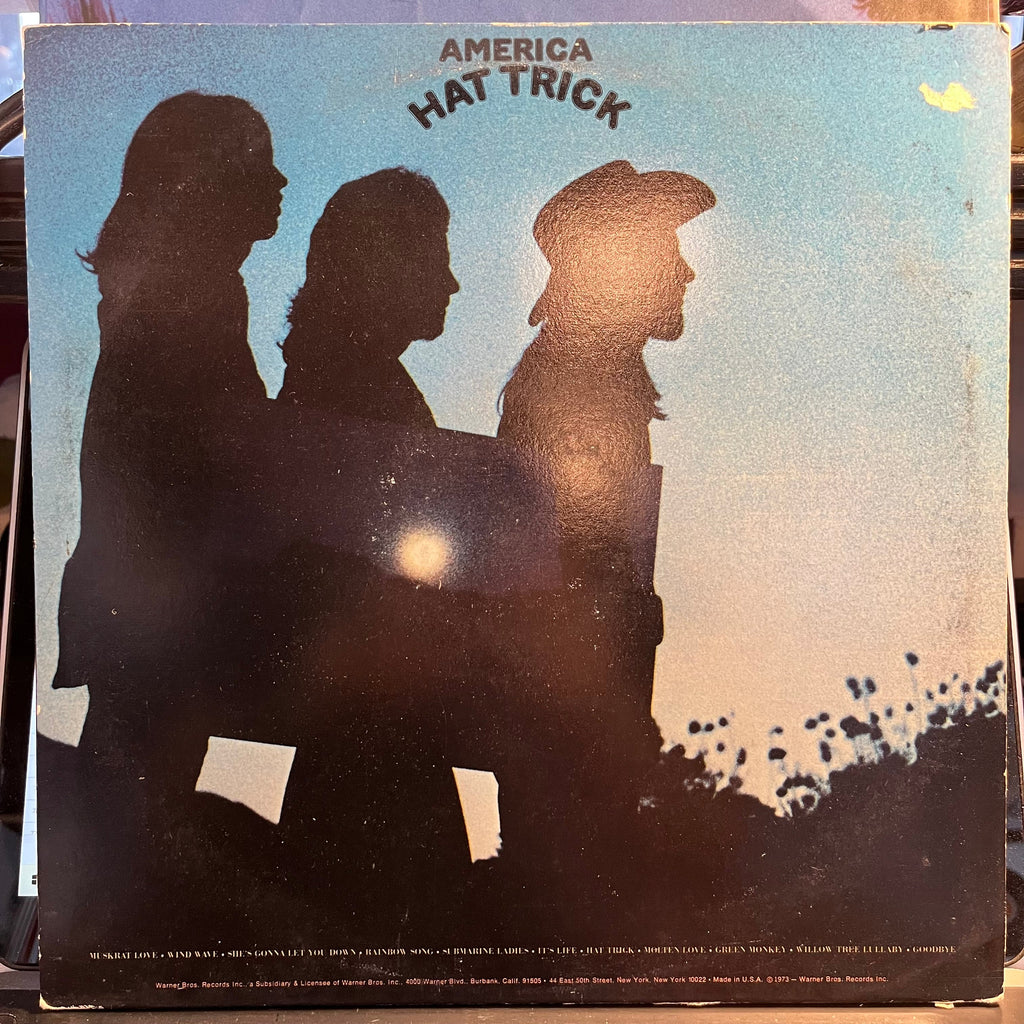 America (2) - Hat Trick (VINYL) | Near Mint (NM) Excellent (EX)