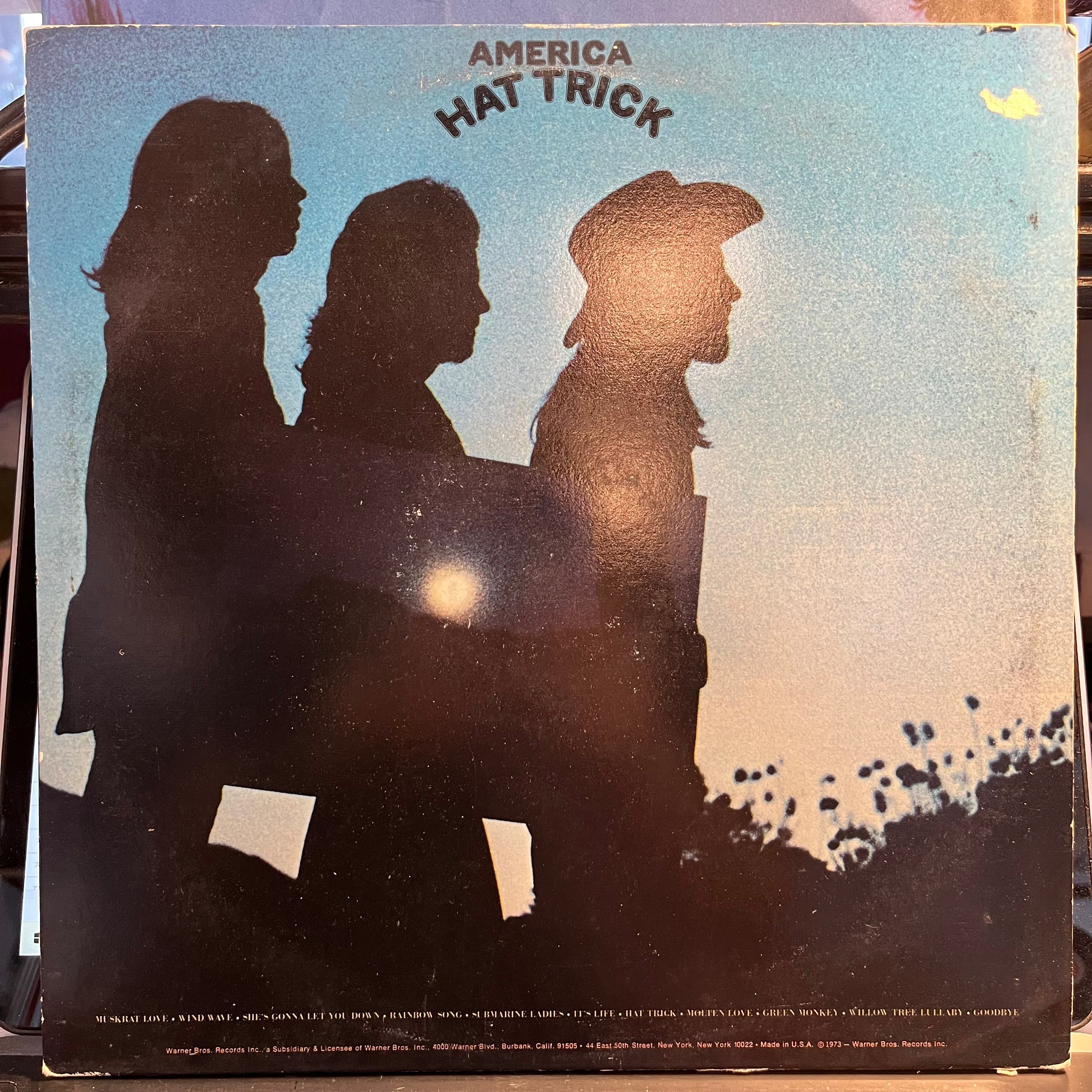 America (2) - Hat Trick (VINYL) | Near Mint (NM) Excellent (EX)