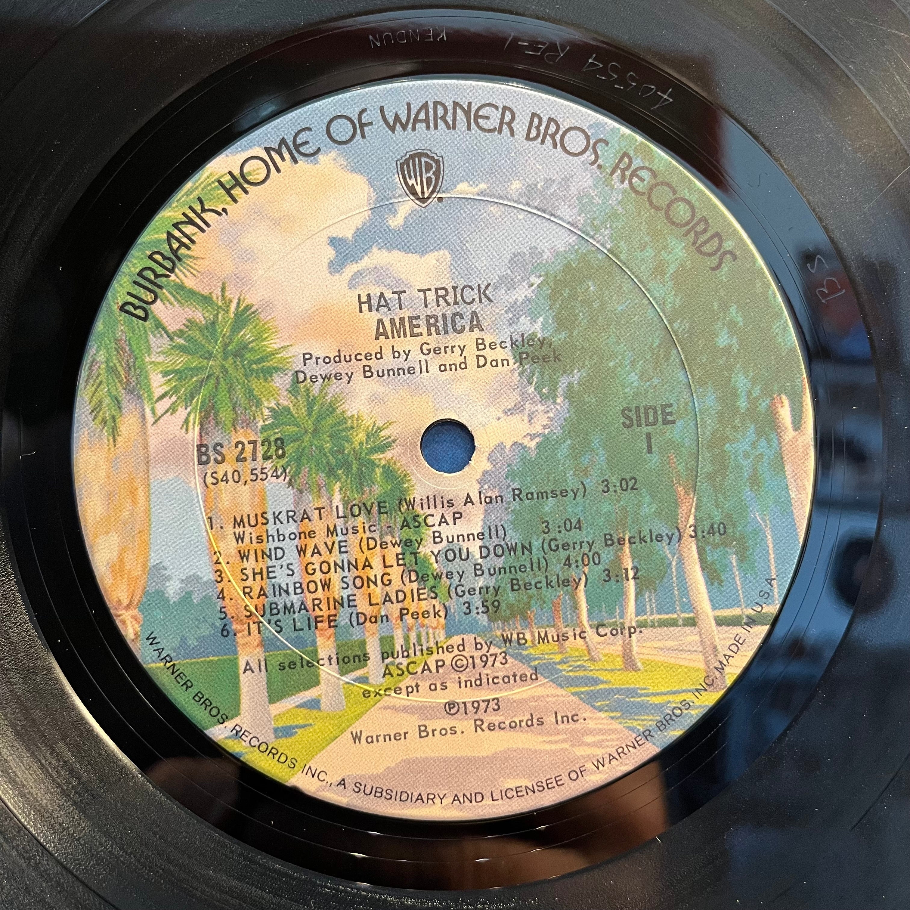 America (2) - Hat Trick (VINYL) | Near Mint (NM) Excellent (EX)