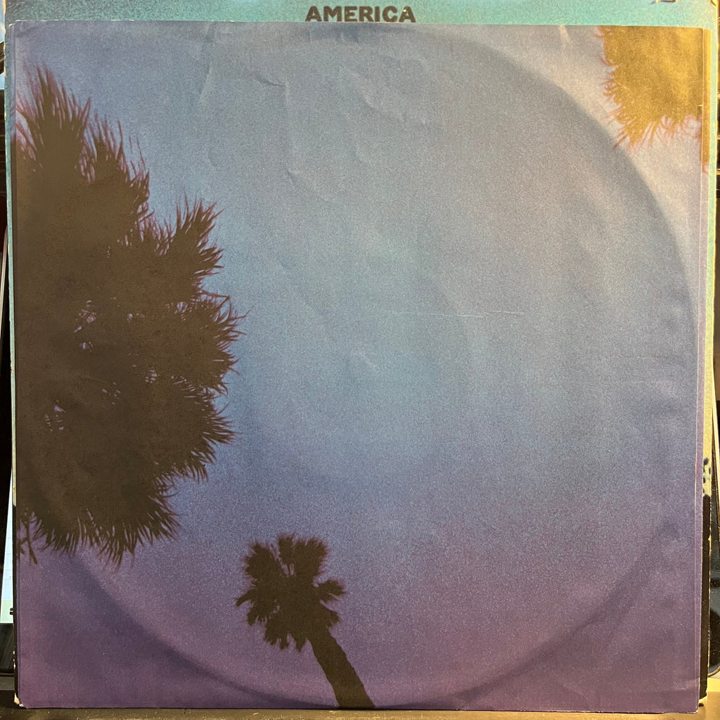 America (2) - Hat Trick (VINYL) | Near Mint (NM) Excellent (EX)