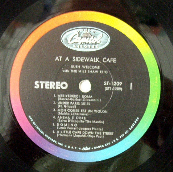 At A Sidewalk Cafe | Very Good Plus (VG+) Very Good Plus (VG+)
