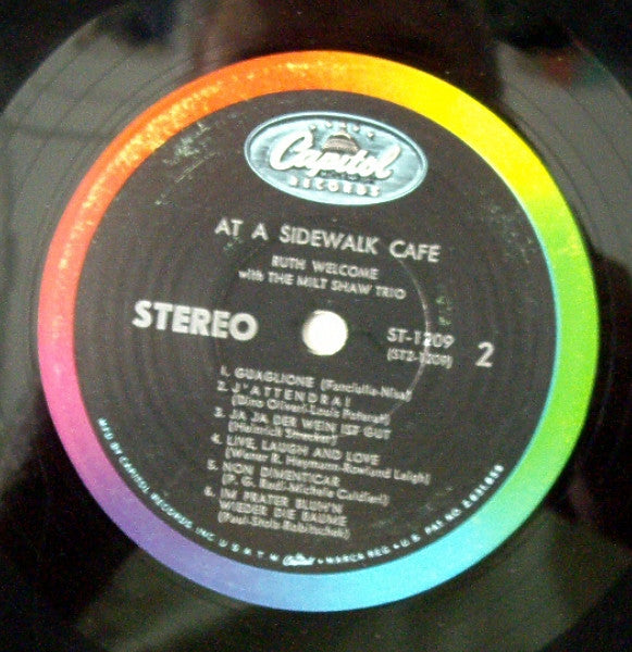 At A Sidewalk Cafe | Very Good Plus (VG+) Very Good Plus (VG+)